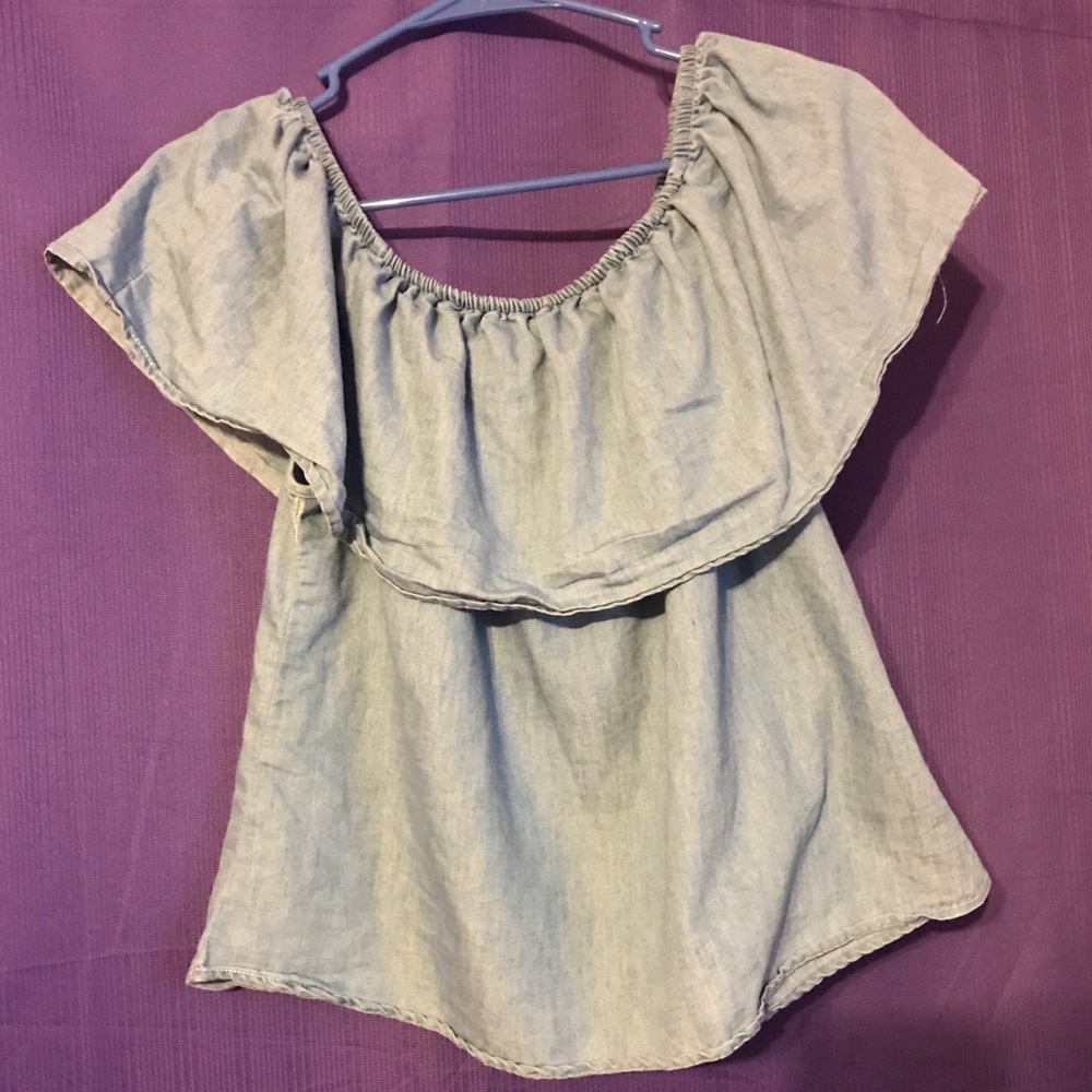 Off the shoulder denim shirt.